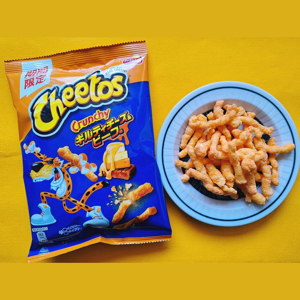 Lotte Cheetos Crunchy Spicy Cheese & Beef Flavor Corn Sticks - 65g - Image 2